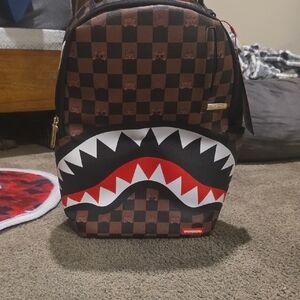 Sprayground Black and Brown Checkered Shark Backpack